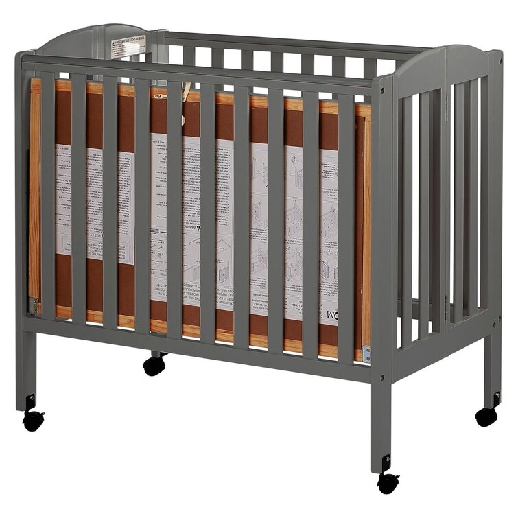 Folding hotsell mini crib